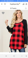 Red plaid long sleeved top with elbow pads